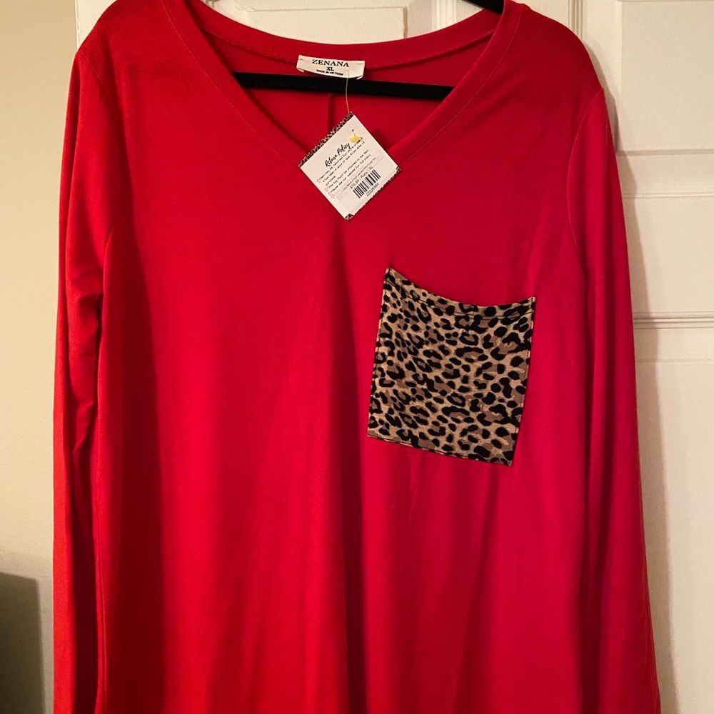 Red long sleeve shirt with leopard print pocket. Size XL